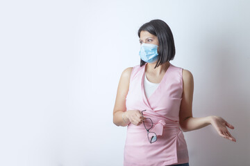 woman with mask posing with casual attire and glasses