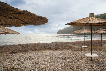 Montenegro. Coast of Adriatic Sea near Old Town of Budva on cloudy autumn day
