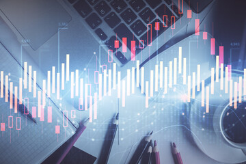 Double exposure of financial chart drawing over table background with computer. Concept of research and analysis. Top view.