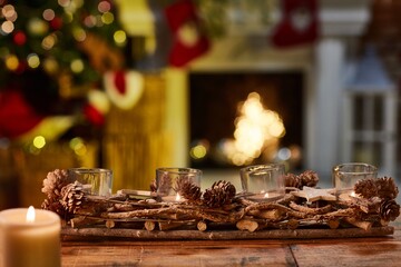 Christmas still life with candle and fireplace - cosy winter image. 