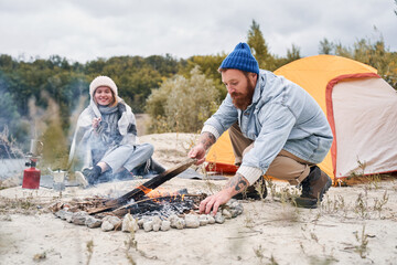 Man and woman are resting in the forest