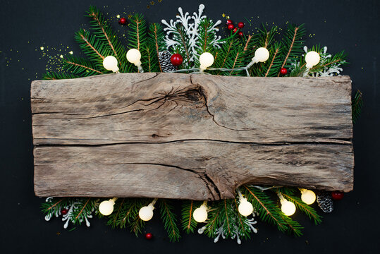 Christmas or new year background on a black table with space for text. Greeting card