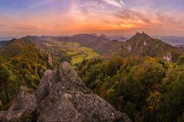 Fototapeta na wymiar the rising sun illuminate the mountain in autumn colors