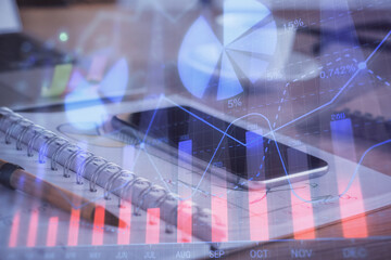 Double exposure of forex chart drawing and cell phone background. Concept of financial data analysis