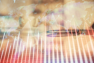 Fototapeta premium Double exposure of forex chart over coffee cup background in office. Concept of financial analysis and success.