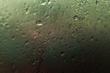 raindrops dripping from glass background
