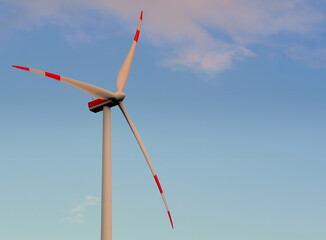 Dreiblättriges, weißes Windrad vor blauem Himmel	
