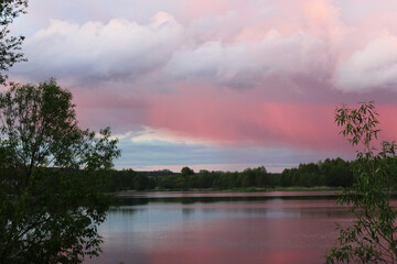 pink sky next to the lake
