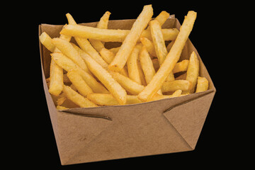 Slices of fried potatoes in a box for food delivery. Tasty fried potatoes from take away menu