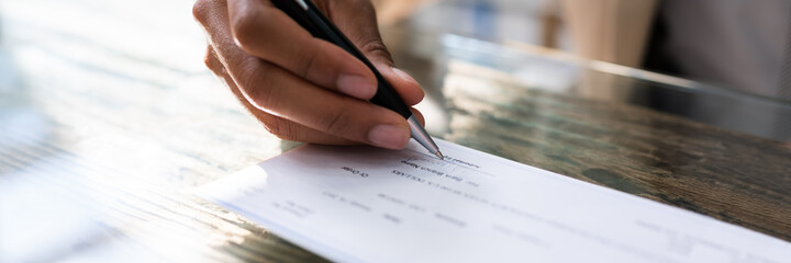 African Writing Money Cheque. Sign Check