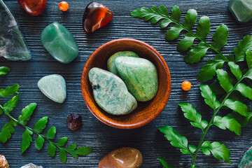 Bowl of Amazonite with Zodiac Stones of Virgo on Blue Background
