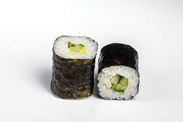 Vegetarian small roll with cucumber on a white background