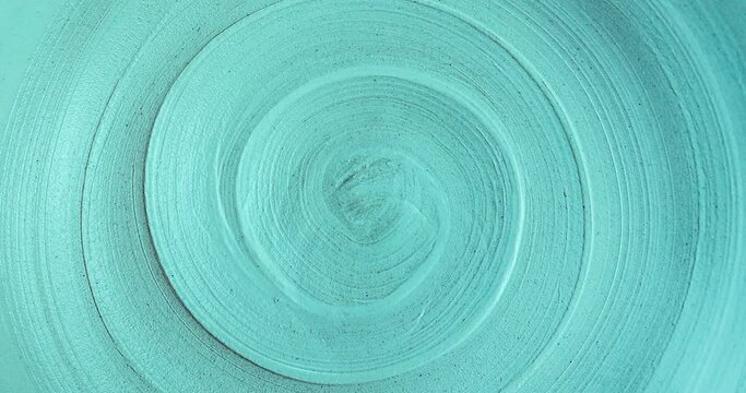 close-up view seamless looping rotation of spiral lines. trendy Aqua Menthe color and abstract background of infinity with copy space