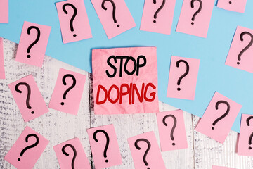 Handwriting text Stop Doping. Conceptual photo quit the use of banned athletic performanceenhancing...
