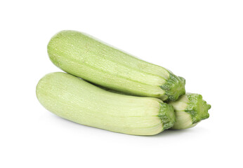 Raw green ripe zucchinis isolated on white