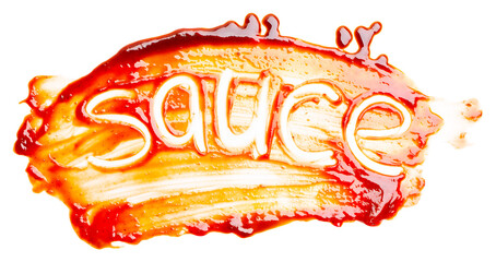 The word SAUCE written with finger on the spilled sauce isolated on white background. Top view, close up.