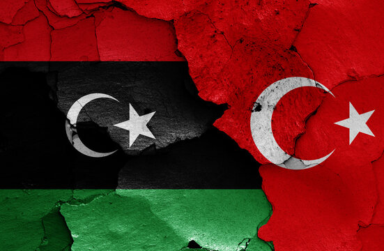 Flags Of Libya And Turkey Painted On Cracked Wall