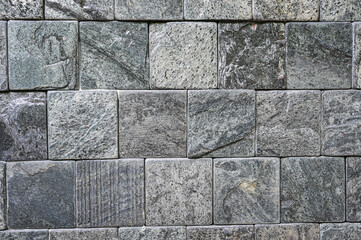 Background wall made of gray stone texture.