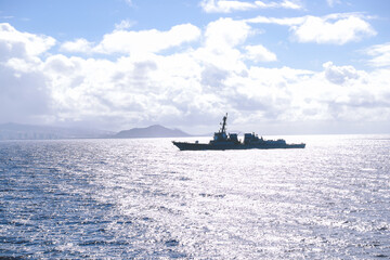 Warship sailing at sea, Oahu Hawaii. In naval terminology, a destroyer is a fast, maneuverable, long-endurance warship