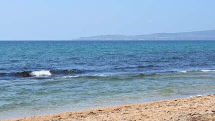 sea sandy beach on a sunny day, clear sea water
