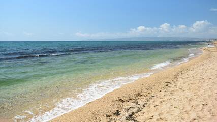 sea sandy beach on a sunny day, clear sea water