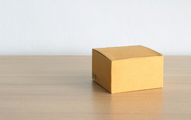 paper box on wooden table background