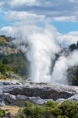 Steam shooting out of Pohutu Geyser, Rotorua, New Zealand