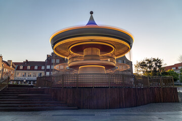 Merry-Go-Round near the Motlawa river at dusk in Gdansk © ricjacynophoto.com
