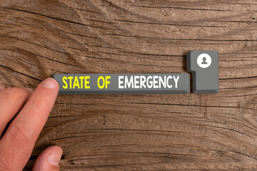 Conceptual hand writing showing State Of Emergency. Concept meaning acknowledging an extreme...