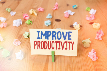 Conceptual hand writing showing Improve Productivity. Concept meaning to increase the machine and...