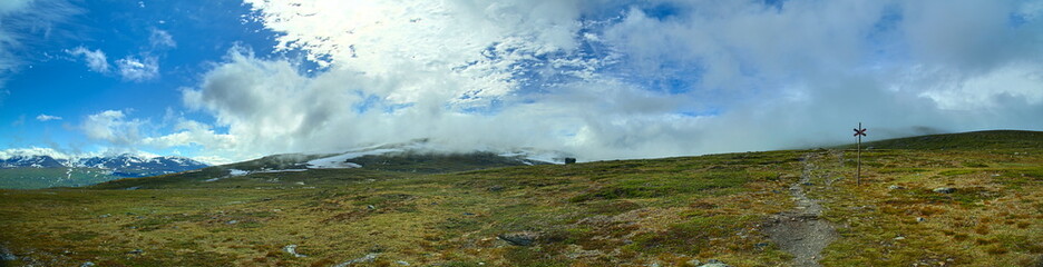 The fog on mount Nuolja is slowly lifting