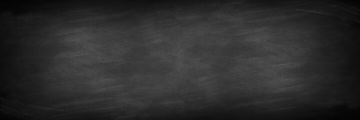 wide Chalkboard texture background. blackboard wall backdrop wallpaper, dark tone. black banner billboard.