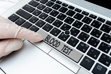Writing note showing Blood Test. Business concept for Extracted blood sample from an organism to...
