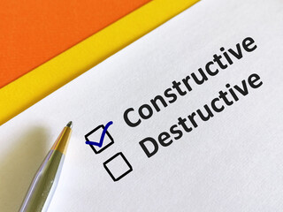 One person is answering question. He is choosing between constructive and destructive.