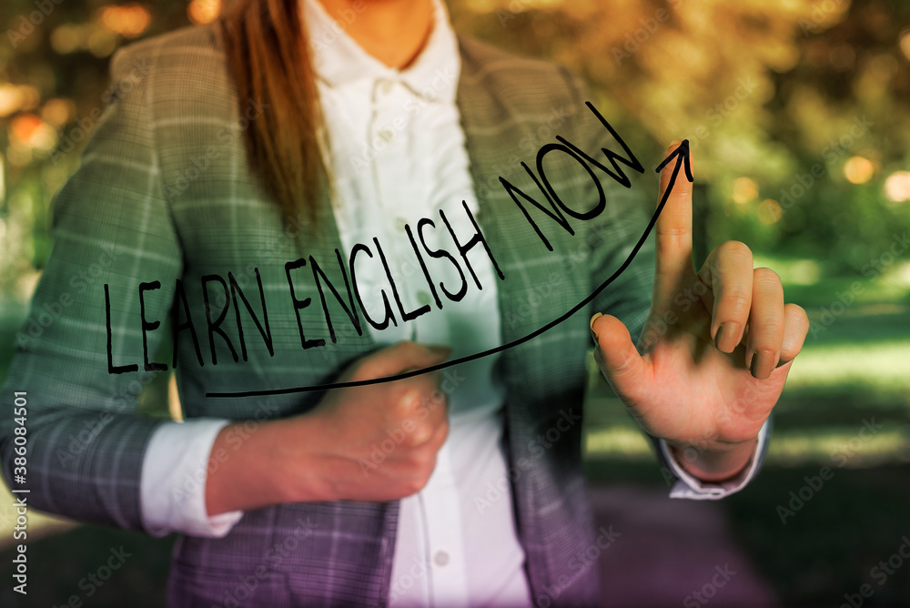 Poster writing note showing learn english now. business concept for gain or acquire knowledge and skill of 