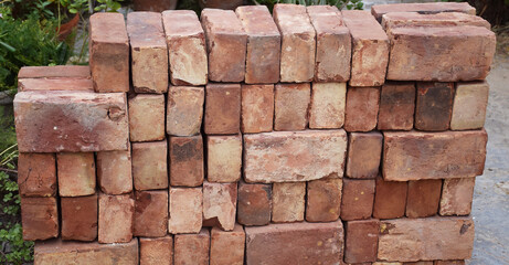 Fototapeta premium Close up of Pile of bricks at a construction site