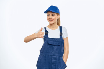 Woman in working uniform blue cap delivery courier delivery service