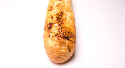 Loaf,baguette,seasoned, white on white background isolated