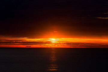 Panoramic nature background (mountains, sea, trees, twilight lights in the sky, waterfront communities), naturally blurred through the wind, seen on tourist spots or scenic spots