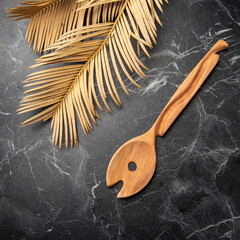 hand carved wooden spoon on the table