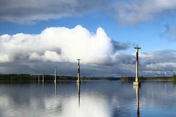 Row of concrete pillars on lake Menstrask, part of the old material ropeway Linbanan Kristineberg-Boliden