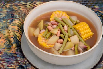 Sayur asem or sayur asam is a popular Indonesian vegetable in tamarind soup. Common ingredients are peanuts, young jackfruit, corn, melinjo,  chayote and long bean.