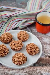 Quinoa puff almond butter chocolate sweet dessert served with hot tea
