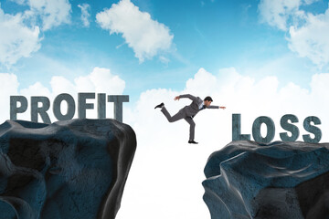 Concept of profit and loss with businessman