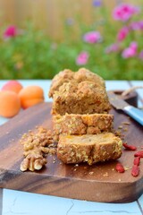 Apricot walnut goji berry oat loaf cake. Selective focus