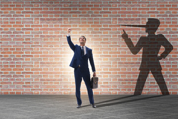 Concept of businessman liar with his shadow