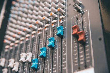 Close-up audio mixer in studio workplace for sound recording equipment and sound system instrument concept.