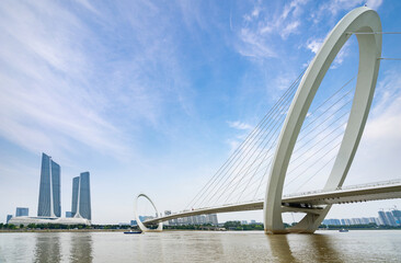 Obraz premium Eye of Nanjing Pedestrian Bridge and urban skyline in Nanjing, China