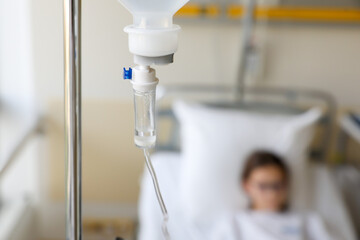 Saline drip medical, Dripping of IV solution, Intravenous therapy for patient in hospital that delivers fluids directly into vein, fastest way to deliver medications fluid. Horizontal, copy space