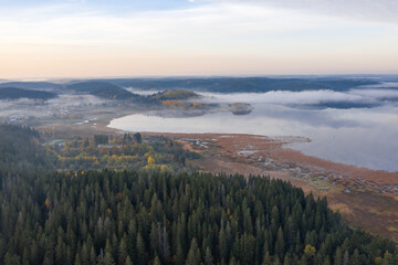 Fototapeta premium Sortavala outskirts. Karelian nature from above. Morning northern landscape, Russian north.